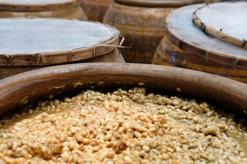 salted soybean paste in jar. soy miso production