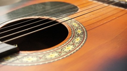 Obraz premium Close up image of an acoustic guitar