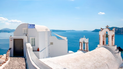 Fototapeta premium Traditional church in Oia village, Santorini island, Greece