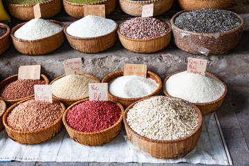 HANOI VIETNAM - AUGUST 2017: Various type of cereal grains (seeds, rice, buckwheat, oats, lentils,chickpeas, beans) on sale at Dong Xuan market