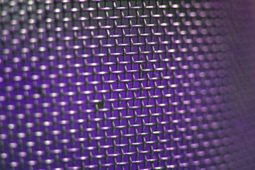 metal mesh with small cells in perspective, silver-violet, macro