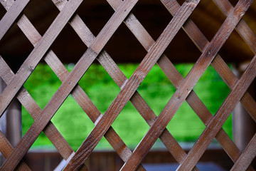 A window of boards in a wooden summer house