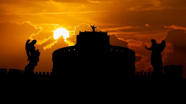 Rome: Castel Sant'Angelo or Castle of the Holy Angel (Mausoleum of Hadrian) at Sunset, is a towering cylindrical building in Parco Adriano, Italy