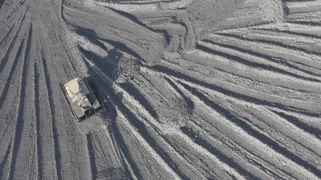 Open pit mine. Aerial view of extractive industry for coal. Top view. Photo captured with drone. DJI Mavic 2 Pro 4k dlog-m ungraded flat.