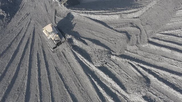 Open pit mine. Aerial view of extractive industry for coal. Top view. Photo captured with drone. DJI Mavic 2 Pro 4k dlog-m ungraded flat.