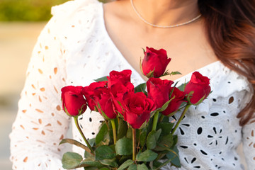 Women with red roses, Women holding red roses, Women's white shirt with red rose