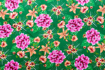 Brazilian chita fabric with roses in a green background taken in Feira de Sao Cristovao, Rio de...