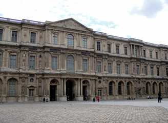 Fototapeta na wymiar Louvre Museum. Paris, France. Beautiful city and ancient buildings tell the story of centuries past.