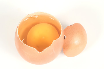Fresh and Raw chicken eggs in egg on white background.