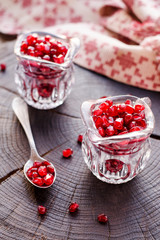  Ribbed red grenade on a wooden background