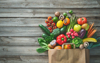 Shopping bag full of fresh vegetables and fruits