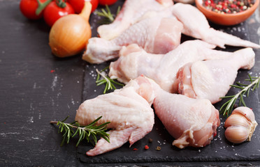 fresh chicken meat with ingredients for cooking