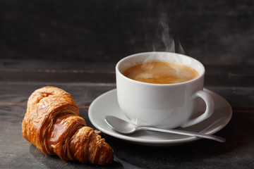 cup of coffee and croissant