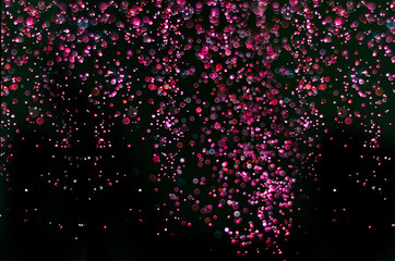 abstract bright colorful violet and red bokeh glitter sparkle blurred background. like molecule spread and absorb.