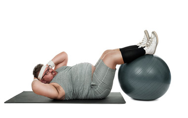 Funny overweight sports nerd working out isolated on white background
