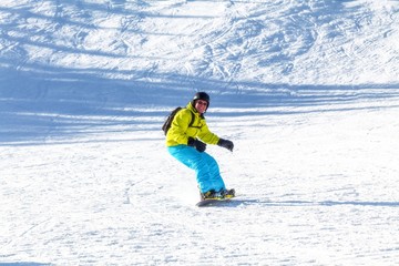 Fototapeta na wymiar Happy Dutch Man Snowboarder On Zell Am See, Austria.Happy Dutch Man Snowboarder On Zell Am See, Austria.