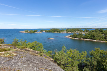 Rocky islands in the blue sea on a summer day. Finland.