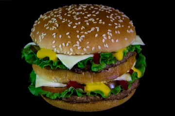 burger on a black wooden background