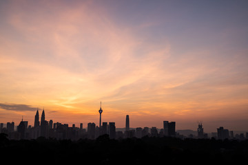 Fototapeta na wymiar Orange Sky during Sunrise Kuala Lumpur cityscape