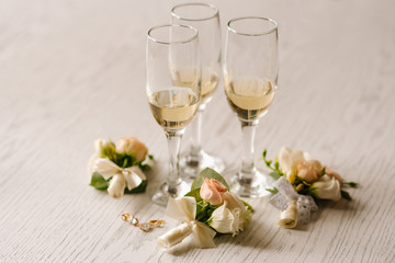 Brides accessories pretarations for wedding day, shoes and buttohole