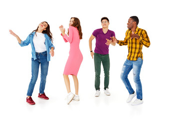 Obraz premium group of cheerful young people men and women isolated on white background.