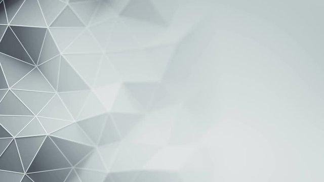 White triangulated polygonal surface. Abstract 3D render of futuristic low poly shape. Seamless loop animation 4k UHD (3840x2160)