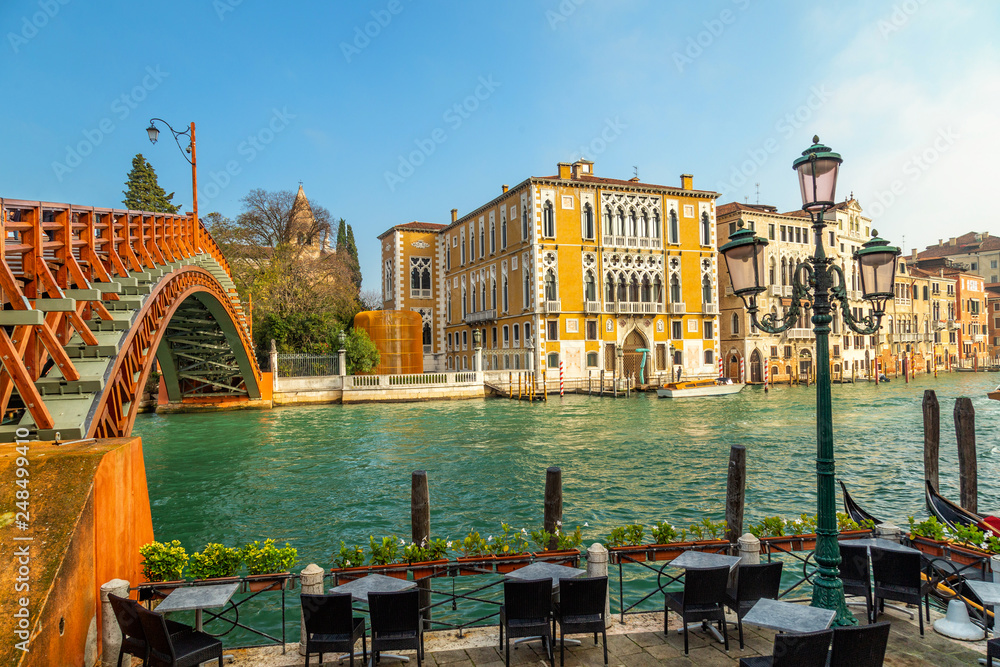 Wall mural bridge ponte dell accademia in venice with the view of grand canal and palace called palazzo cavalli