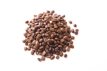 close up bunch of brown Coffee beans isolated on white