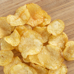 Delicious potato chips with salt