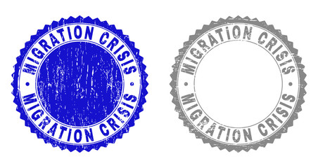 Grunge MIGRATION CRISIS stamp seals isolated on a white background. Rosette seals with distress texture in blue and grey colors.