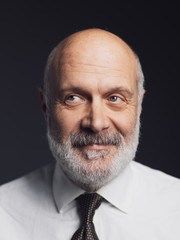 Confident smiling mature man portrait