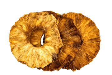 Dried pineapple rings on white background.