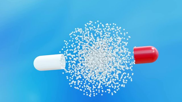Capsule pills are slowly falling on a blue background. Open and out of them flies medicine. Then the capsule closes and the tablet falls further.