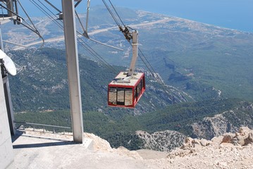 Cable car cabin, mountains, blue sky, equipment, object