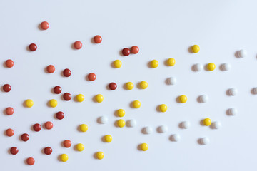 colorful chocolate coated candy isolated on white background