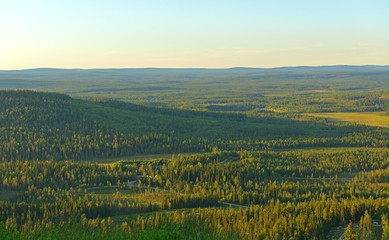 Fototapeta na wymiar Beautiful sunset in northern hills in Finnish Lapland