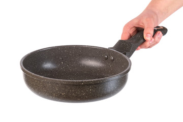 New Frying pan isolated in hand on white background