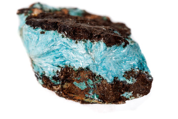 Macro mineral aurichalcite stone on microcline on white background
