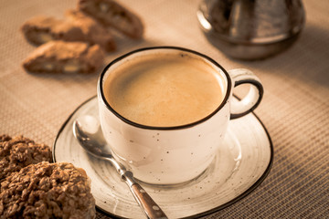 fresh coffee and cookies with Cezve on background. concept morning coffee