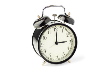 Black alarm clock with two bells on white background