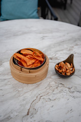 sweet banana crisps and fried cashew nuts