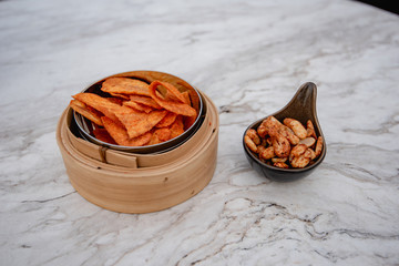 sweet banana crisps and fried cashew nuts