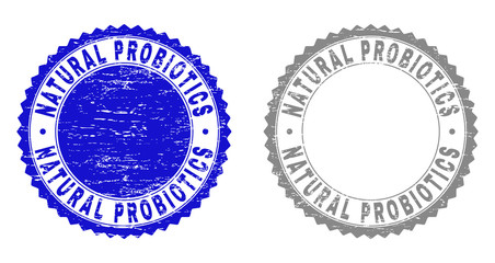 Grunge NATURAL PROBIOTICS stamp seals isolated on a white background. Rosette seals with grunge texture in blue and gray colors.