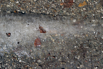 Melting snow asphalt stone grit slush road