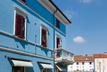 Fototapeta na wymiar A picturesque colorful house in Cesenatico on a summer day, Emilia Romagna