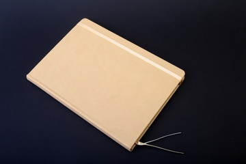 notebook and pen on white table. Selective focus