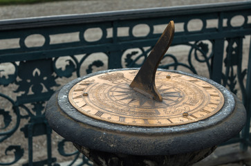 sundial closeup in the winter moist water drops zoomed in