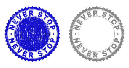 Grunge NEVER STOP stamp seals isolated on a white background. Rosette seals with grunge texture in blue and gray colors. Vector rubber stamp imitation of NEVER STOP label inside round rosette.