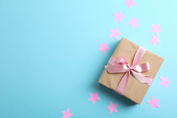 Gift box on color background and space for text. Top view