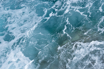 sea water surface with a spindrift